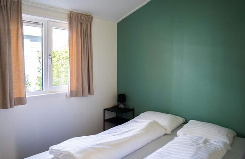 Municipality of Rhenen House | The Heuvelrug Cottage, with hot tub for 6 people is fully equipped!