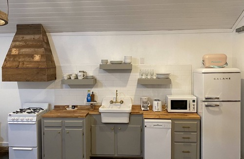Laurel Cottage | The Little Manor on 7th, secluded cottage moments from Historic Downtown Laurel