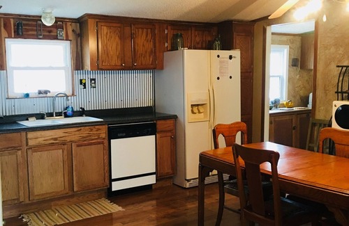Mount Ida House | The lodge and black bear cafe at Forest Farm and Retreat Centre