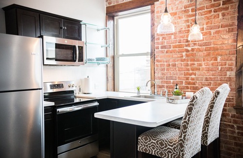 Claude Apartment | The Lofts Downtown: Studio B, Beautiful modern studio loft in downtown Claude