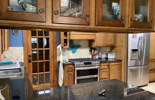 Montgomery House | The Manor 4 BR w/Pool Table, Swimming Pond, and Sand Volleyball