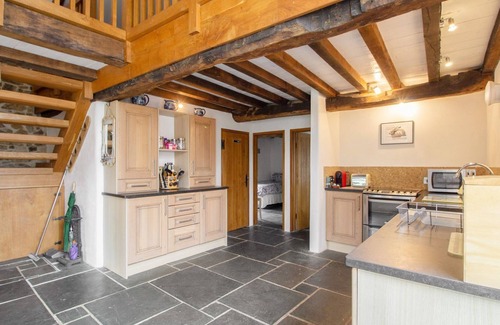 Highampton Cottage | THE MILKING PARLOUR, family friendly, with open fire in Highampton
