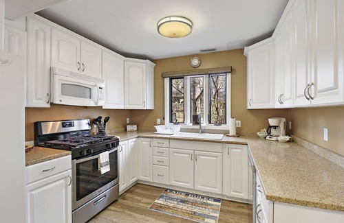 Fontana Condo | The Oaks Retreat |Abbey Springs Resort |Upper & Lower Living Rooms |Wraparound Deck |Pool |Beach