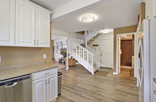 Fontana Condo | The Oaks Retreat |Abbey Springs Resort |Upper & Lower Living Rooms |Wraparound Deck |Pool |Beach