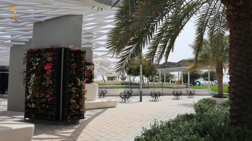 Masdar City Apartment | The Oasis Shore 1BR - Tranquil Getaway Near Masdar Park & City Centre Mall