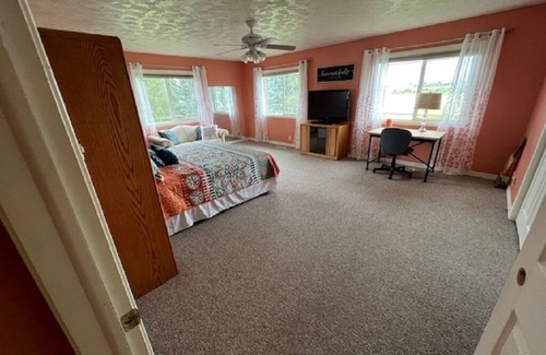 Rexburg Bed & Breakfast | The Orange Room at the Salem House Deluxe private Bedroom in shared living space