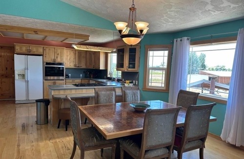 Rexburg Bed & Breakfast | The Orange Room at the Salem House Deluxe private Bedroom in shared living space