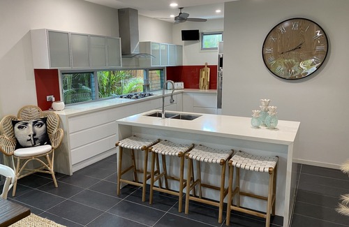 Mudjimba House | The Palm - Beachside Home with Heated Pool, Cinema & Games Room