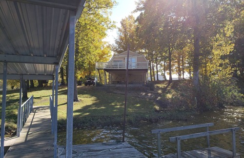 Cannelton Cabin | The Point is a waterfront rental with covered boat dock at Rocky Point Indiana