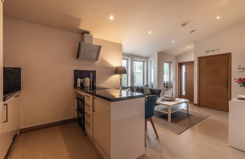 Pitlochry Cabin | The Retreat Cabin with covered hot tub, sauna & cinema room.