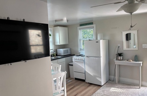 North Carolina Coast Apartment | The Sand Bucket is within walking distance to the beach and boardwalk.