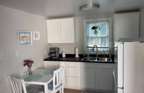 North Carolina Coast Apartment | The Sand Bucket is within walking distance to the beach and boardwalk.