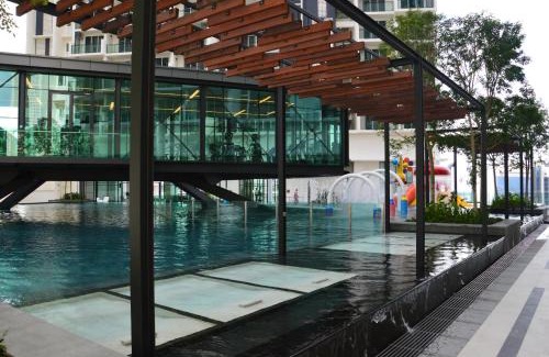 Bunga Paya Pantai Apartment | The Shore Residence Apartment