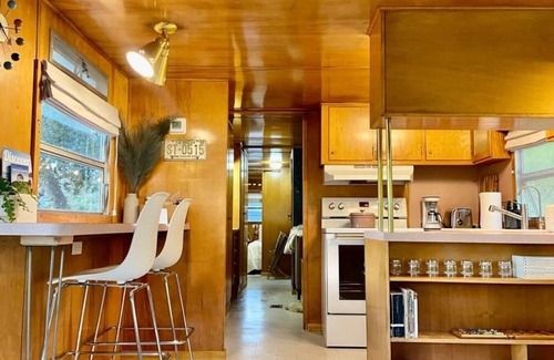 Arroyo Grande Apartment | The Spartan is a fun 1950's vintage trailer under oak trees overlooking a 1 acre organic farm!