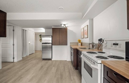 Okotoks Apartment | The Sunflower PrivateEntry PetsOK Patio TV