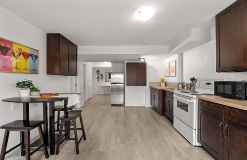 Okotoks Apartment | The Sunflower PrivateEntry PetsOK Patio TV