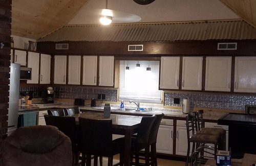 Forest City House | The Tin Roof 4bd, 1.5bthnConveniently located in Forest City near 74 bypass