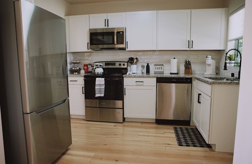 Northeast Heights House | The White House, Stylish Renovation, Central ABQ Retreat near Dining & Shopping.
