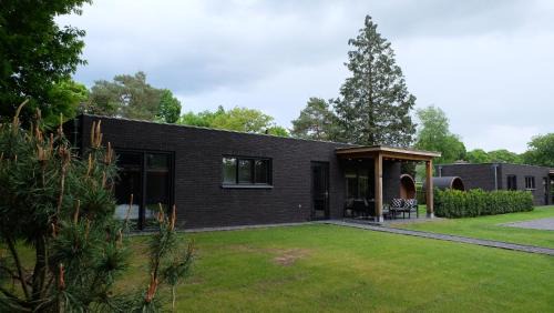 Voorthuizen House | The White Oak - Luxe 4 persoons bungalow met prive sauna
