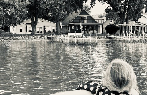Spirit Lake House | The Yellow House on East Lake! Dock access to bring your boat.