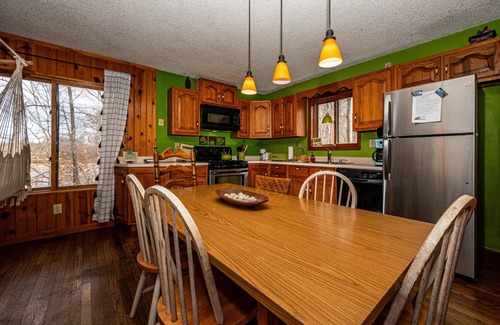 Morgantown House | Thirty wooded acres, secluded, private five-acre lake, hot tub.