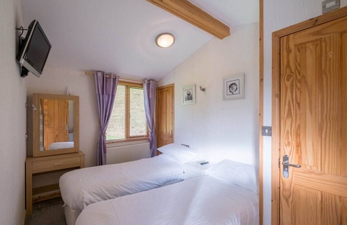 Knott End-on-Sea Cabin | This beautiful traditional lodge situated within a woodland setting is the perfect location for you