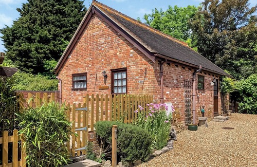 Poole Cottage | This charming detached cottages is the perfect getaway for a romantic trip.