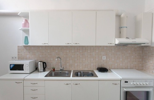 Keratsinion House | this family friendly house is surrounded by a patio, a place to relax!