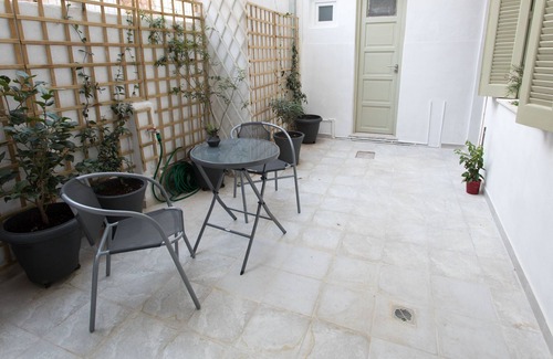 Keratsinion House | this family friendly house is surrounded by a patio, a place to relax!