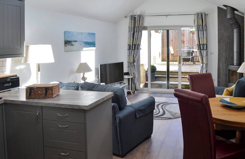 Treator Cottage | This ground floor apartment benefits from it’s own private decked area.