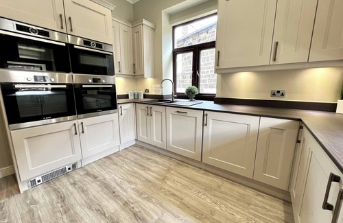 Haworth Apartment | This luxury, boutique style, stone built, 3 bedroom, 2 bathroom apartment by Above Rubies sits directly on Haworth’s renowned cobbled Main Street and is only a stone’s throw from the iconic Parsonage, home to the Brontë sisters.