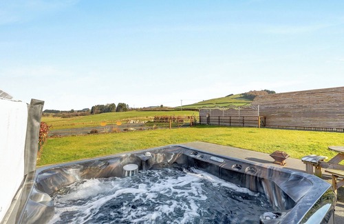 St Harmon Cottage | This luxury lodge with a private hot tub is perfect for exploring Mid Wales.