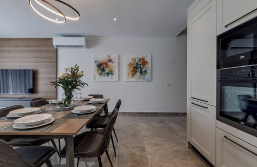 Mellieħa Heights Apartment | This modern refurnished apartment is a self-catering accommodation located Mellieha. Perfectly located in a quit area of Mellieha but surrounded with all amenities, the bus stop is just five minutes walk from the apartment, from this bus term