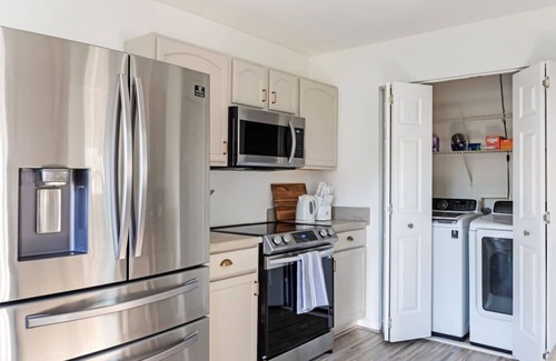 Northeast Raleigh House | This Must Be The Place | Private Gym + Fenced Yard