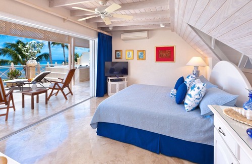 Saint Peter Parish Condo | This Penthouse is situated directly on a beautiful sandy beach and has a wonderful roof deck terrace