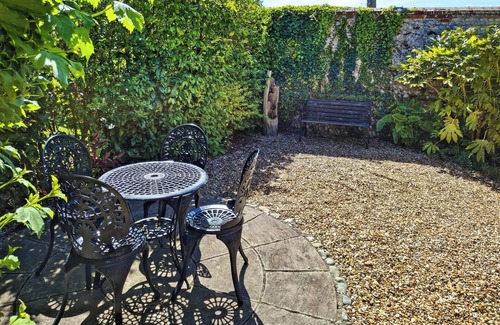 Ingham Cottage | This picture-perfect barn conversion, boasts a private hot tub and sauna.