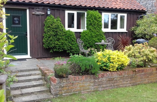 Thorpe Market Cottage | Thorpegate Cottage - Set Around An Old Farmyard In A Village Location