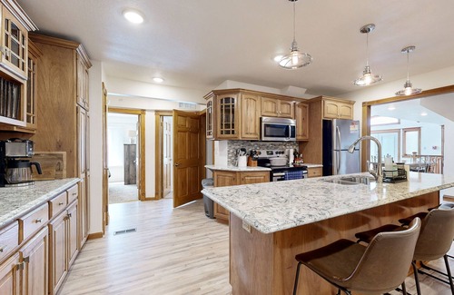 Campbellsport Condo | Tiki Beach Condo, with stunning lake views, beach access & bar/restaurant onsite