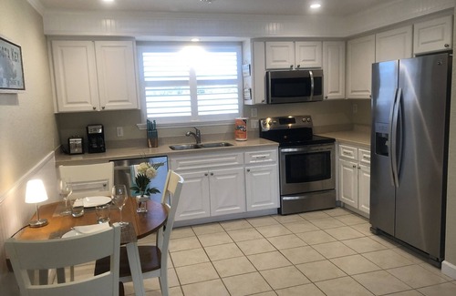 Englewood Apartment | Tiki Penthouse overlooking tropical garden! Relax without the Boca Grande prices