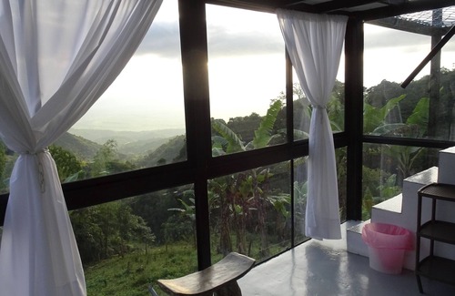 Palmira House | Tiny Glass House with Incredible Views