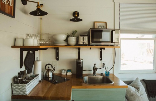 Meeker House | Tiny Home with one Queen bed on main floor and one Queen bed in loft. Sleeps: 4