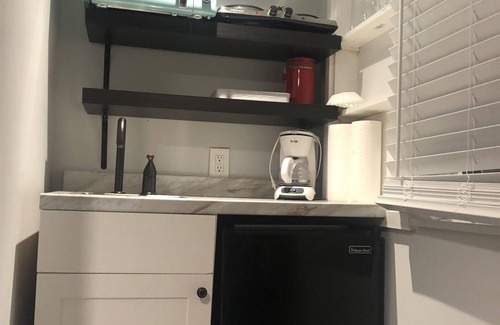 Historic Uptown Apartment | Tiny rental +patio+BBQ+2bikes+Parking- great area!