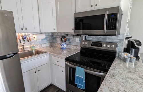 McCutcheon Field Apartment | Toes In The Sand, You Won't Want to Leave!