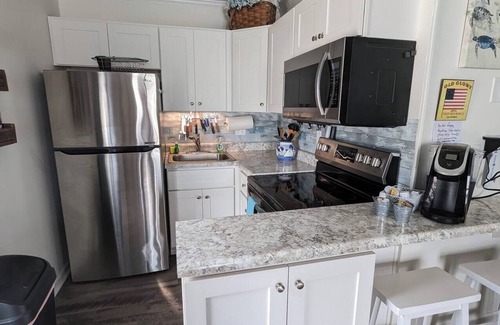 McCutcheon Field Apartment | Toes In The Sand, You Won't Want to Leave!