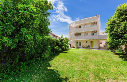 Tomicici Apartment | Top-Floor Apartment: Stunning Sea Views Steps from the Beach