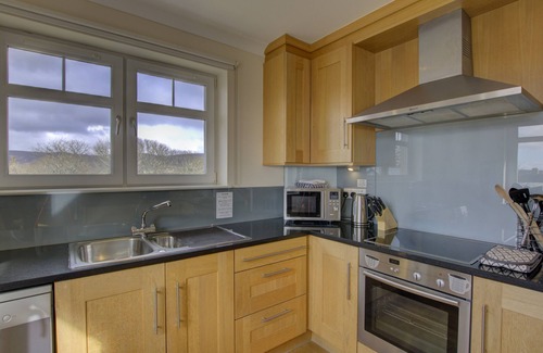Brora Apartment | Top-floor, two-bedroom golf apartment with views over the famous James Braid Brora Golf Course