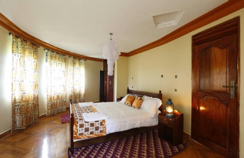 Kibaale Hotel | Top of The World Lodge