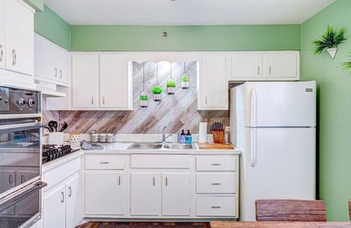 Elmwood Park Apartment | Top Rated Condo - 65” TV | Family-friendly