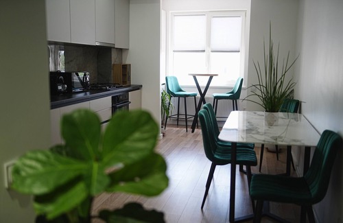 Riscani Apartment | Top Spot in Riscani! 1BR Near Shops & Restaurants