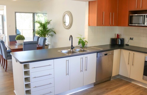 Urangan House | Top Tier Modern split level, pet-friendly family holiday home on the Esplanade with dog-friendly